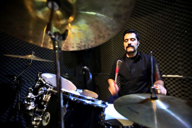  In this picture taken on Friday, Jan. 25, 2013, Iranian musician Ardeshir Jofreh, a member of a ban