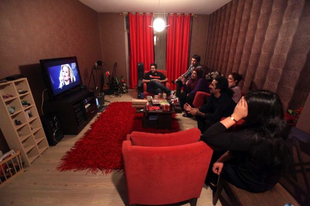  In this picture taken on Monday, Feb. 4, 2013, members of an Iranian band called "Accolade" and the